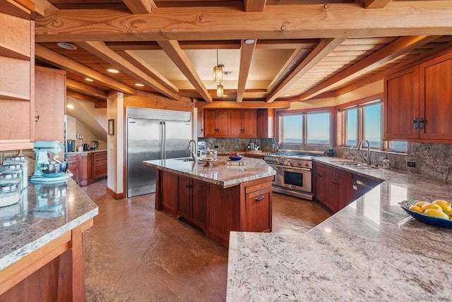 kitchen with beam ceiling, backsplash, light stone counters, and high end appliances