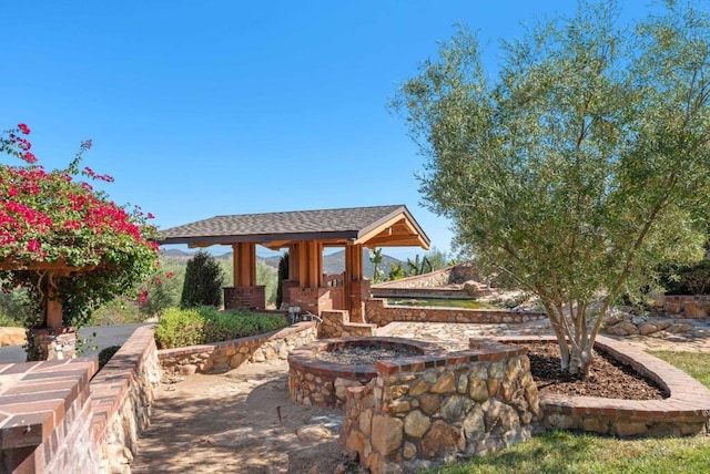 view of patio featuring a gazebo