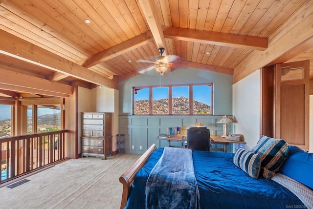 bedroom with carpet, a mountain view, vaulted ceiling with beams, and wooden ceiling