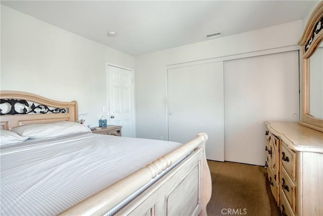 9179 Ravenswood Ave, Hesperia, CA 92344 - bedroom with a closet, carpet, and visible vents