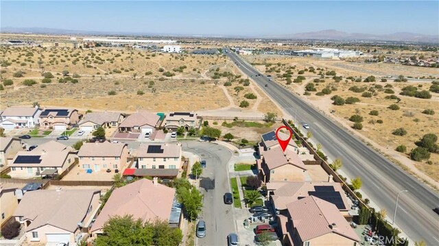 9179 Ravenswood Ave, Hesperia, CA 92344 - drone / aerial view with a residential view and a mountain view