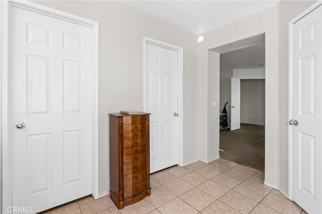 bedroom featuring light tile patterned floors