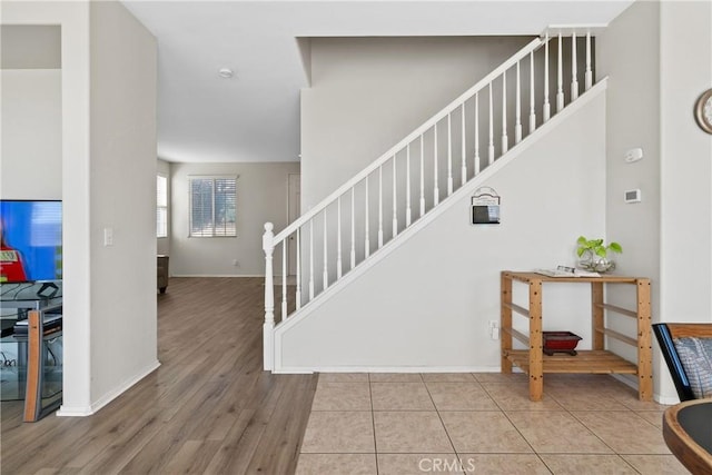 9179 Ravenswood Ave, Hesperia, CA 92344 - staircase with baseboards and wood finished floors