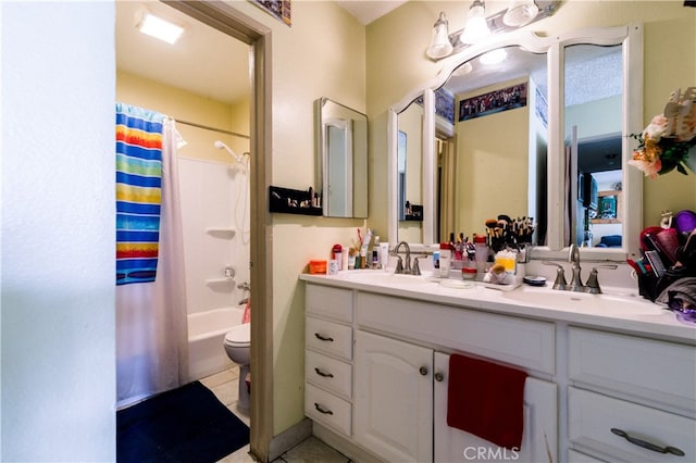 full bathroom with shower / bath combination with curtain, tile patterned flooring, vanity, and toilet