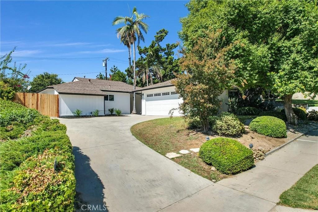 single story home with a garage