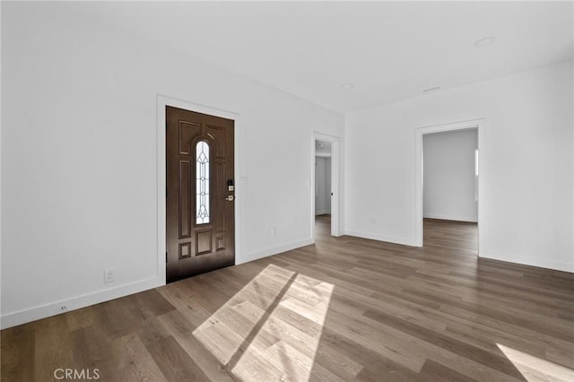 entrance foyer with hardwood / wood-style floors