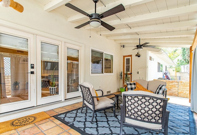 view of patio / terrace featuring ceiling fan and french doors