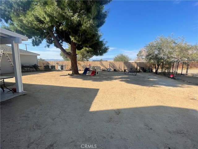 view of yard featuring a fenced backyard