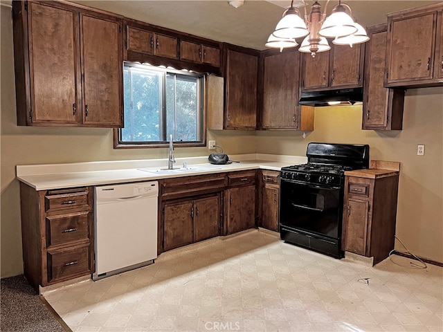 kitchen with pendant lighting, sink, black gas range, dishwasher, and an inviting chandelier