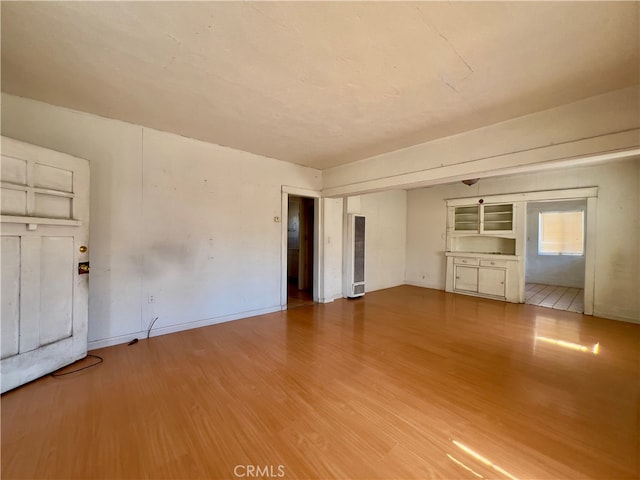 interior space with hardwood / wood-style flooring