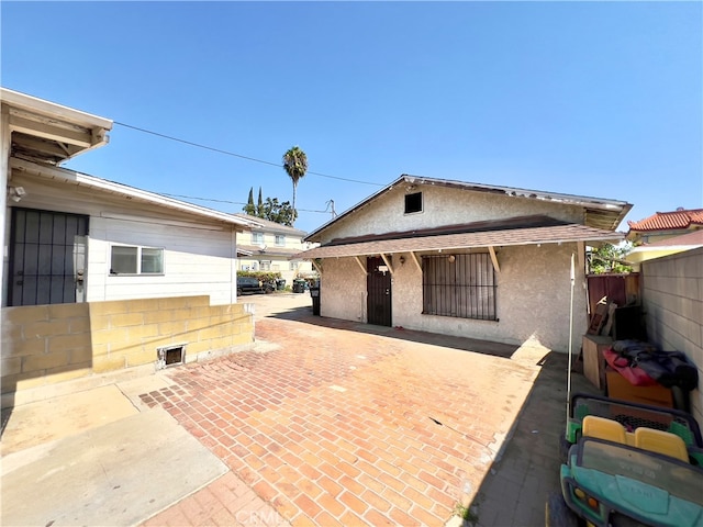 exterior space with a patio area