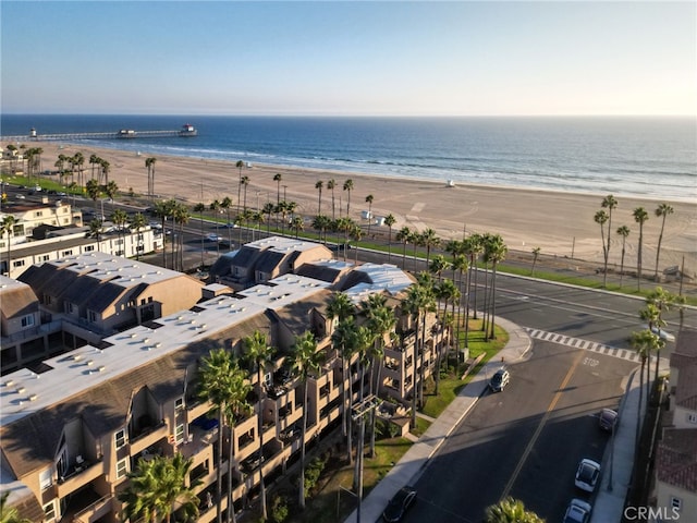 aerial view with a beach view and a water view