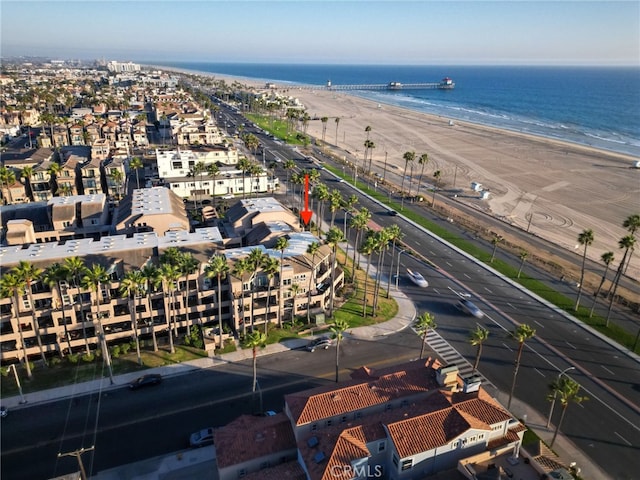 aerial view featuring a water view and a view of the beach