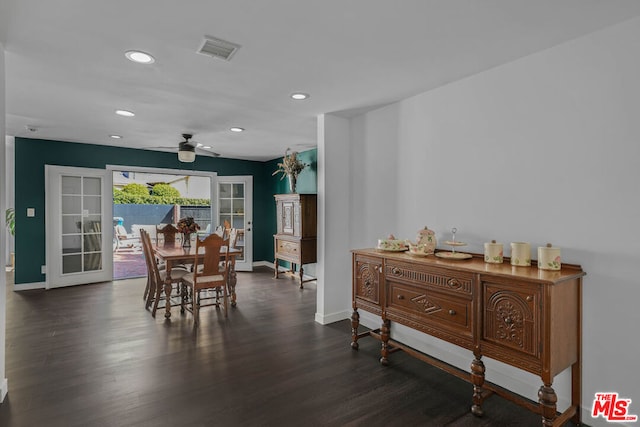 dining room featuring dark hardwood / wood-style flooring, ceiling fan, and french doors