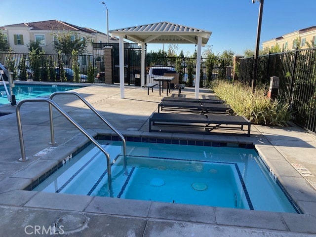 view of swimming pool featuring a patio