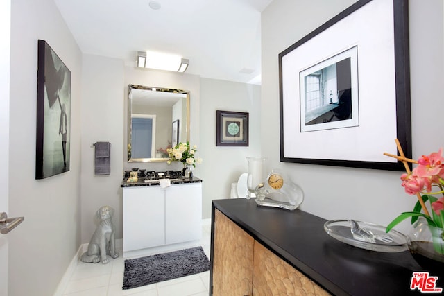 bathroom with vanity and tile patterned floors