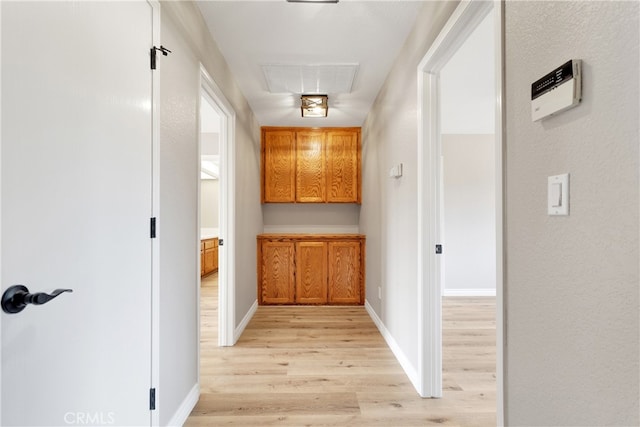 hallway featuring light hardwood / wood-style floors