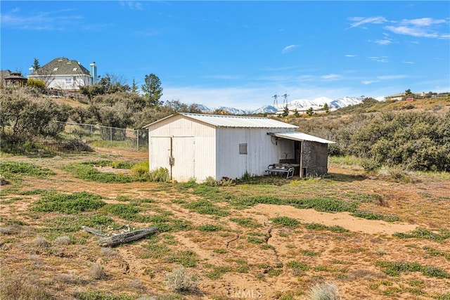 view of outdoor structure with a mountain view