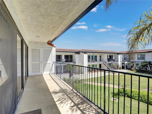 balcony featuring a residential view