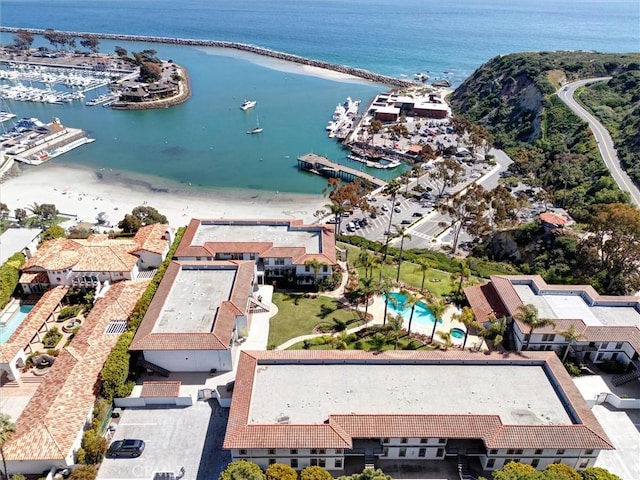 birds eye view of property featuring a water view