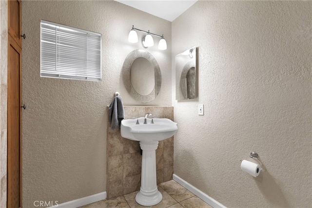 bathroom with tile patterned flooring