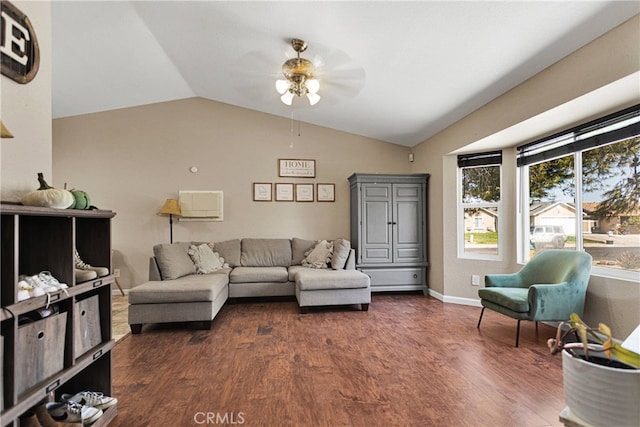 living room with lofted ceiling, ceiling fan, and dark hardwood / wood-style flooring