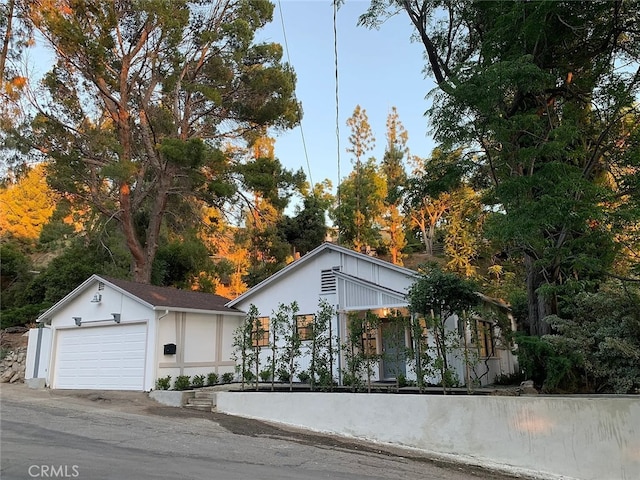 view of front of property with a garage