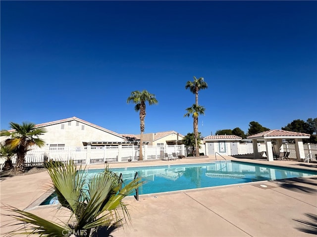 view of pool featuring a patio area