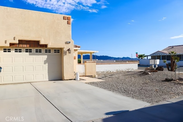 view of side of property featuring a mountain view