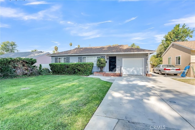 ranch-style home with a front yard and a garage