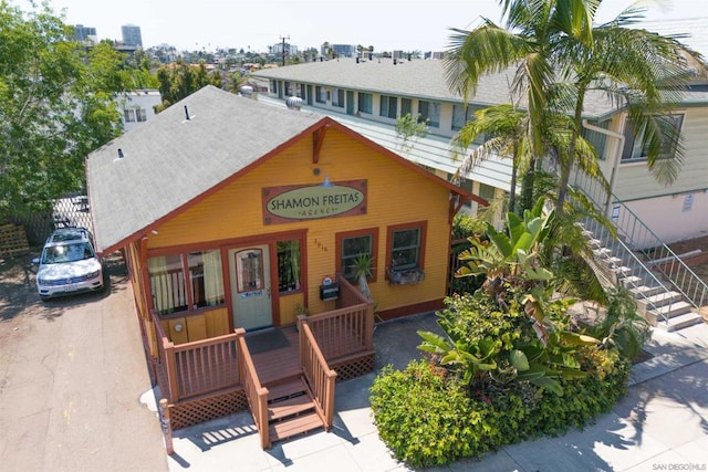 view of front of home with a deck