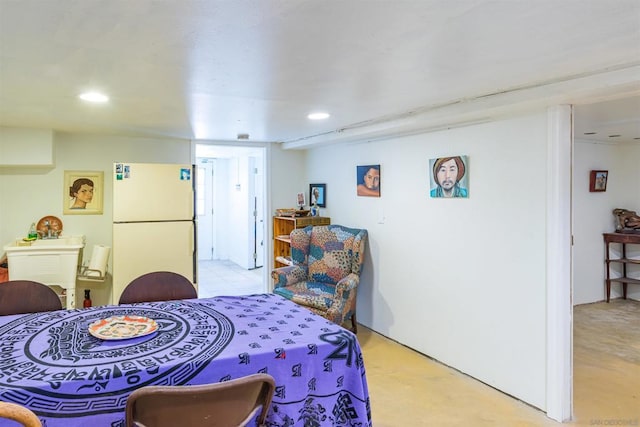 bedroom with white fridge