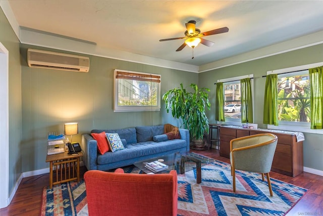 living room with a wall mounted AC, ceiling fan, and dark hardwood / wood-style flooring