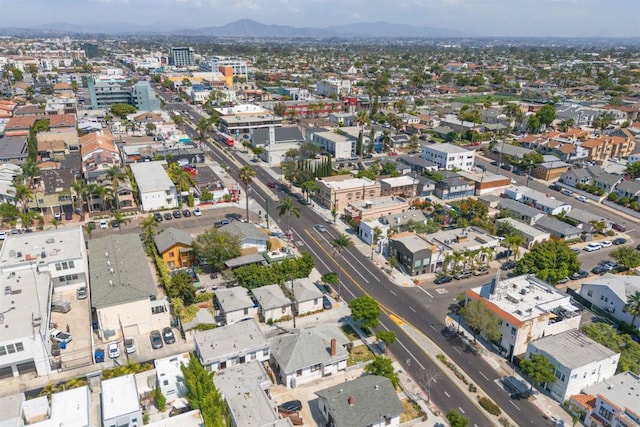 birds eye view of property featuring a mountain view