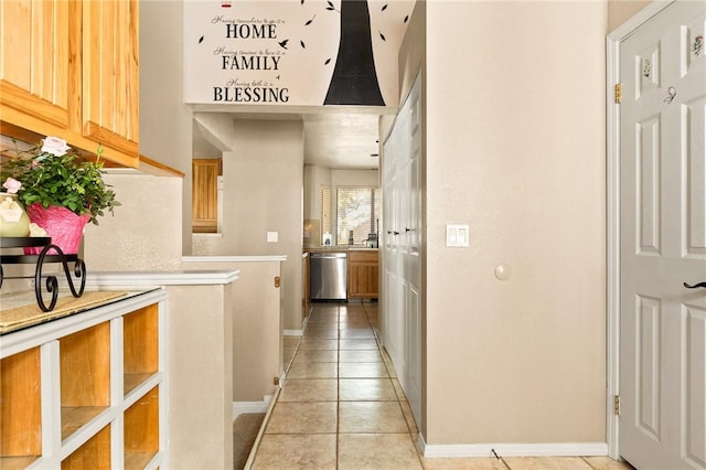 hallway with light tile patterned floors