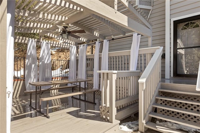 deck with a pergola and ceiling fan