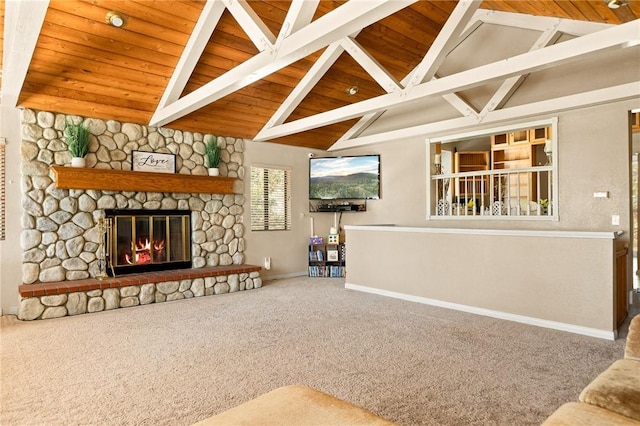 unfurnished living room with a stone fireplace, high vaulted ceiling, carpet, wood ceiling, and beam ceiling