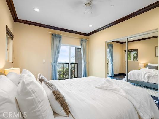 bedroom with a closet, crown molding, and ceiling fan