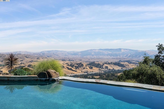 view of pool featuring a mountain view