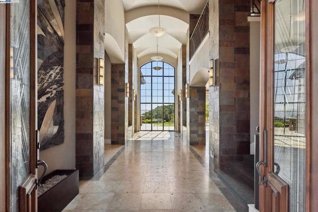 foyer entrance with vaulted ceiling