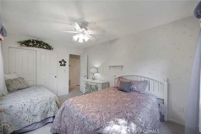 bedroom with light carpet, a closet, and ceiling fan