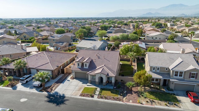 drone / aerial view featuring a mountain view