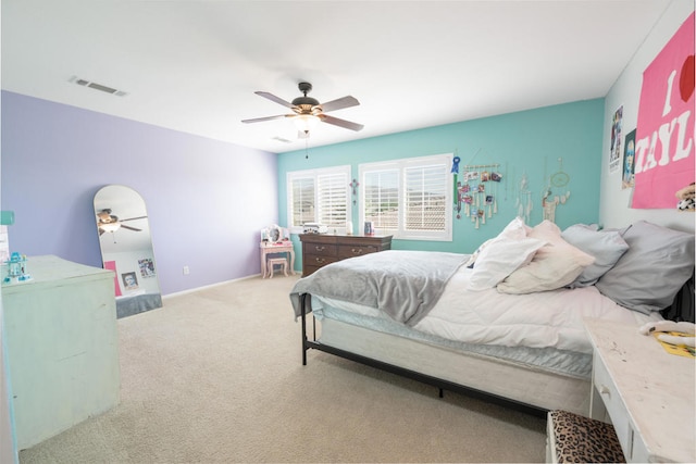 bedroom featuring ceiling fan and light colored carpet