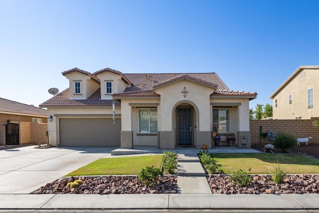 mediterranean / spanish house with a front lawn