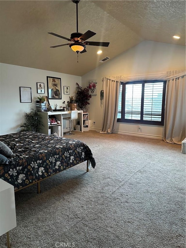 bedroom with baseboards, visible vents, carpet, vaulted ceiling, and a textured ceiling