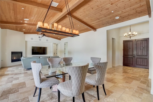 dining space with ceiling fan with notable chandelier, lofted ceiling with beams, and wood ceiling