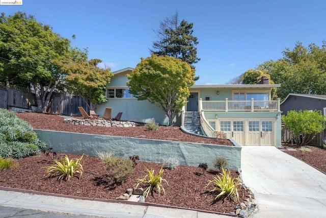 view of front of property with a balcony