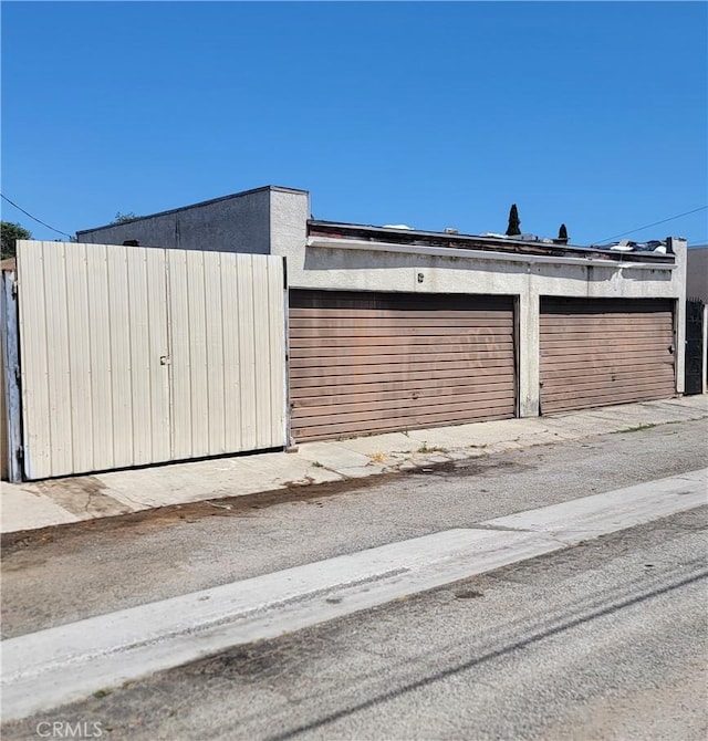 garage with fence