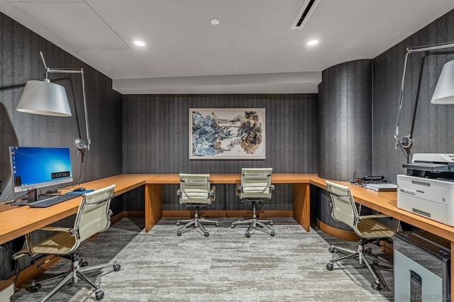 office area featuring light colored carpet