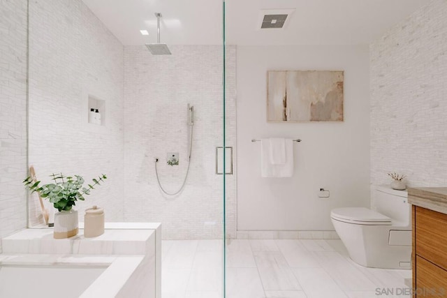 bathroom featuring an enclosed shower, vanity, and toilet